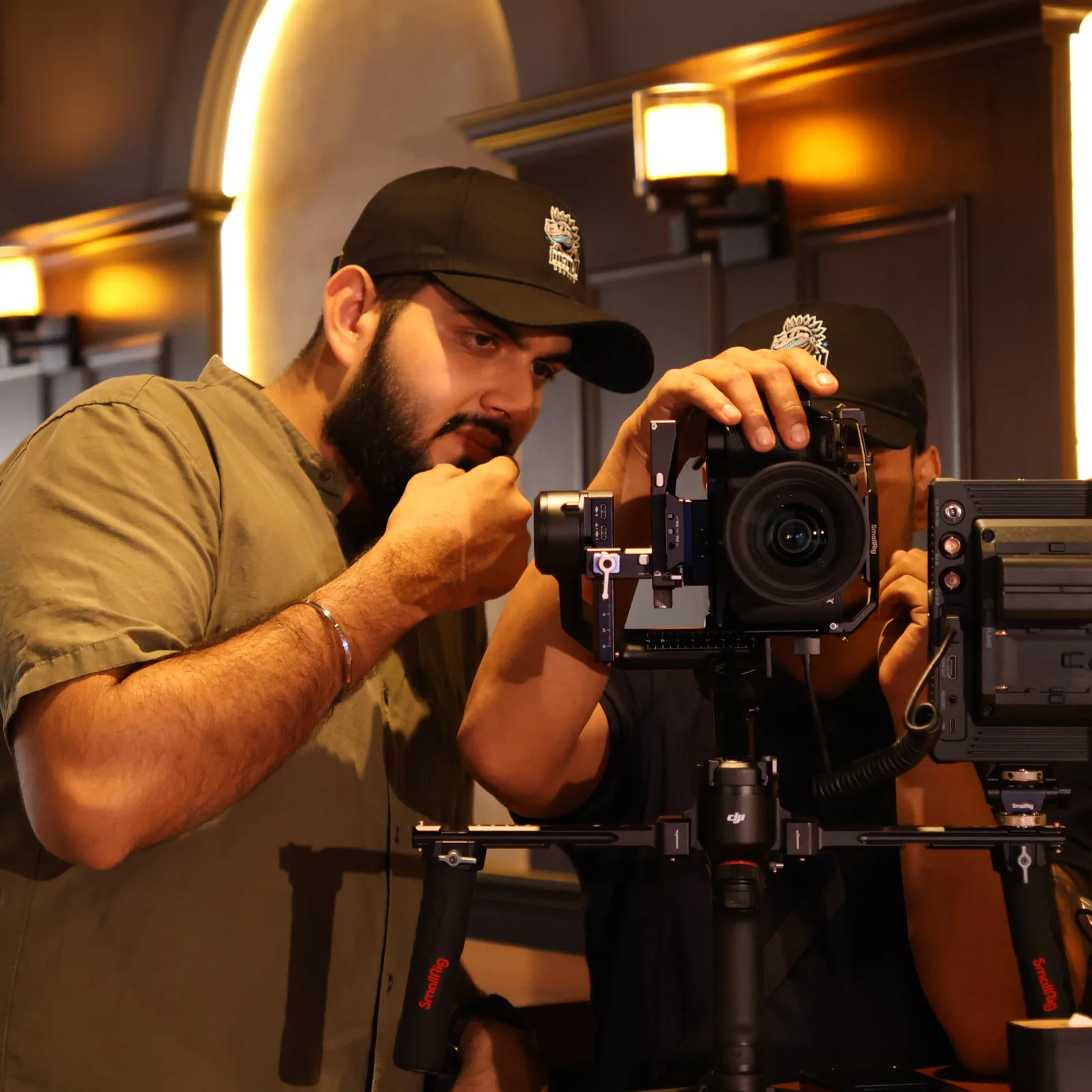 Digital Degens production team setting up a camera